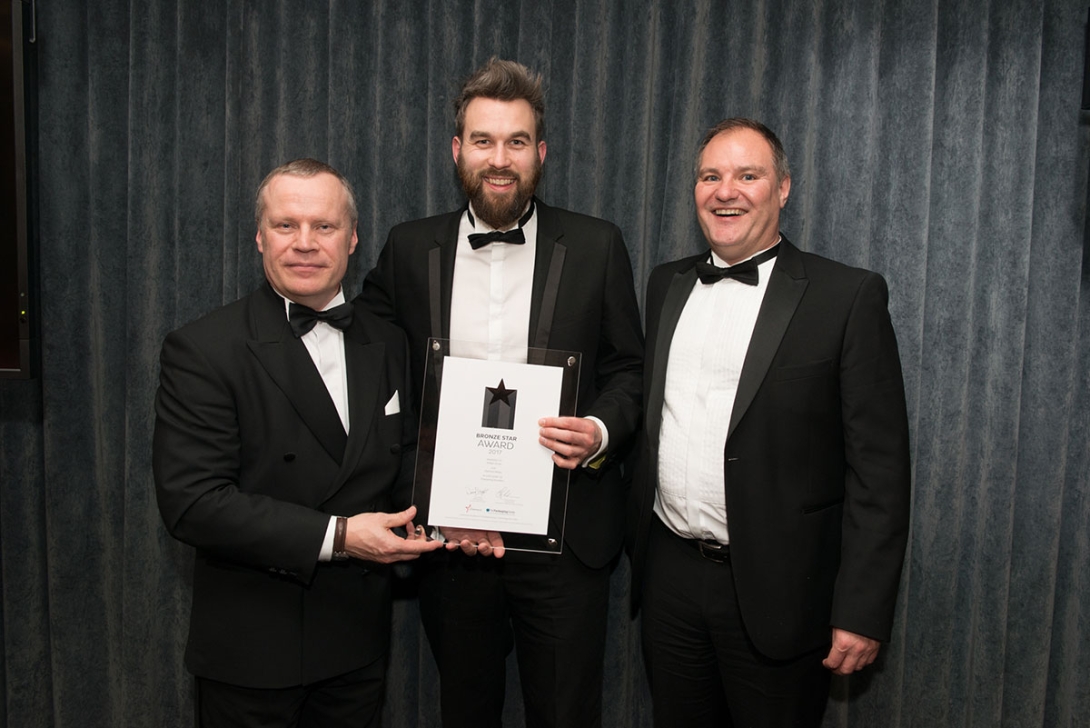 Ardagh Group designers Chris Barker and Andy Reyner receive one of the Starpack awards from judge Mike Swain.